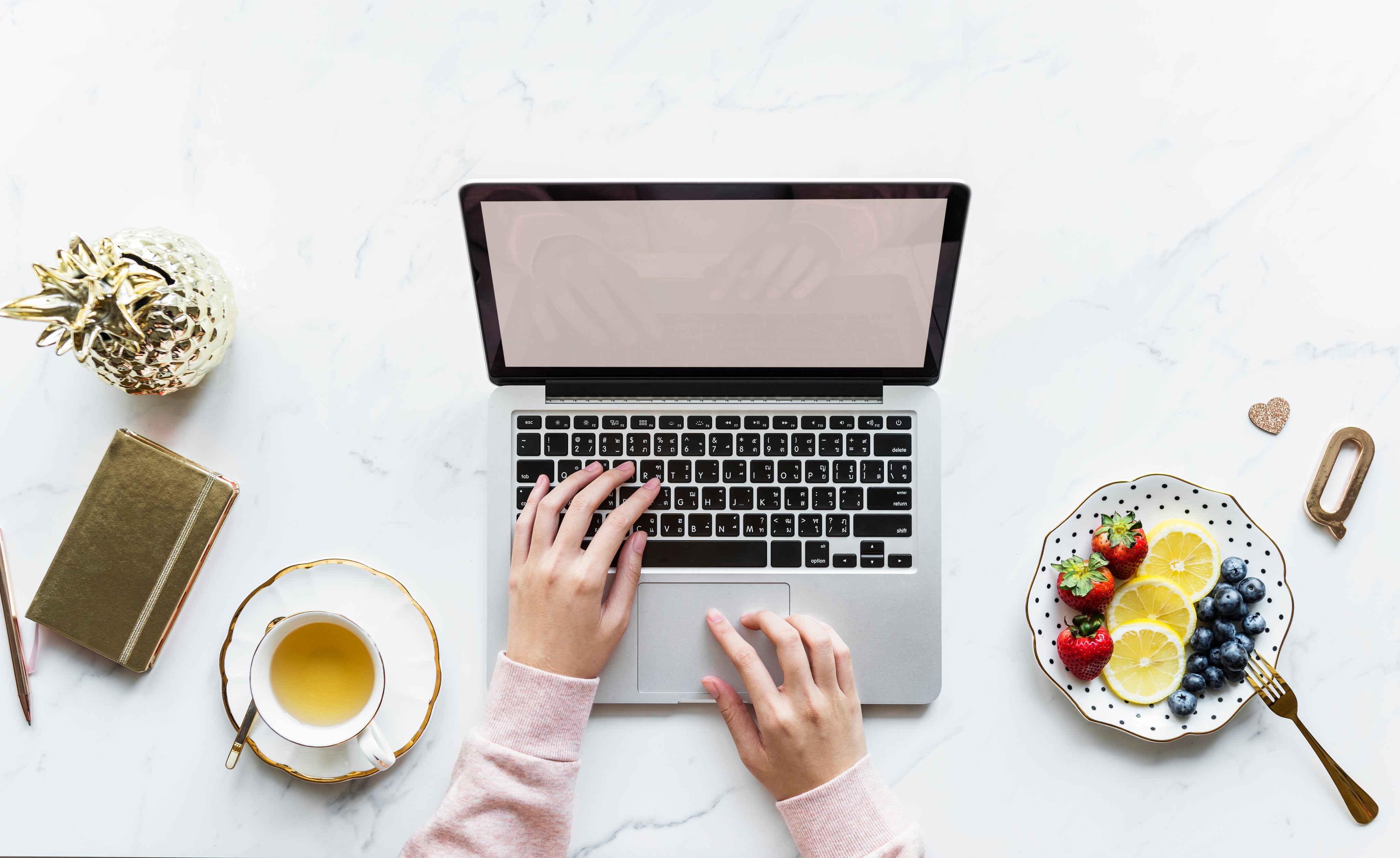 laptop-at-the-table-with-tea-at-side.jpg